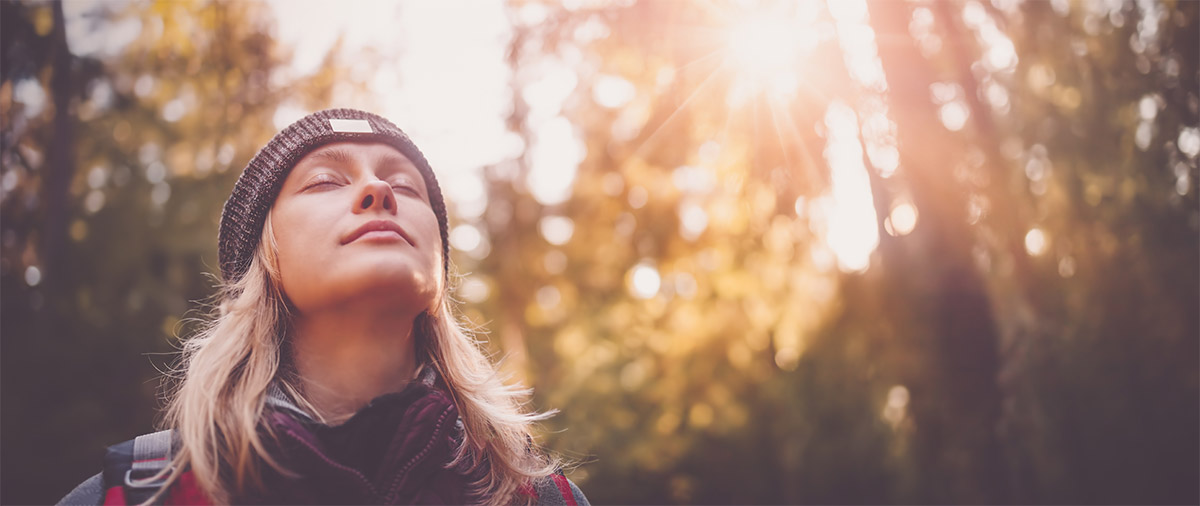 Woman Smelling The Forest Air