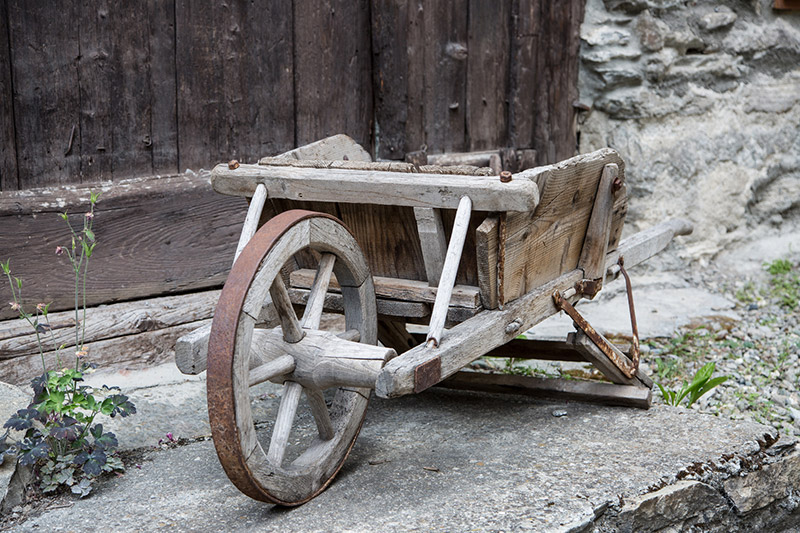 Ancient Wooden Wheel Barrow